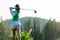 Golfer sport course golf ball fairway.Â  People lifestyle woman playing game golf tee of on the green grass.Â 